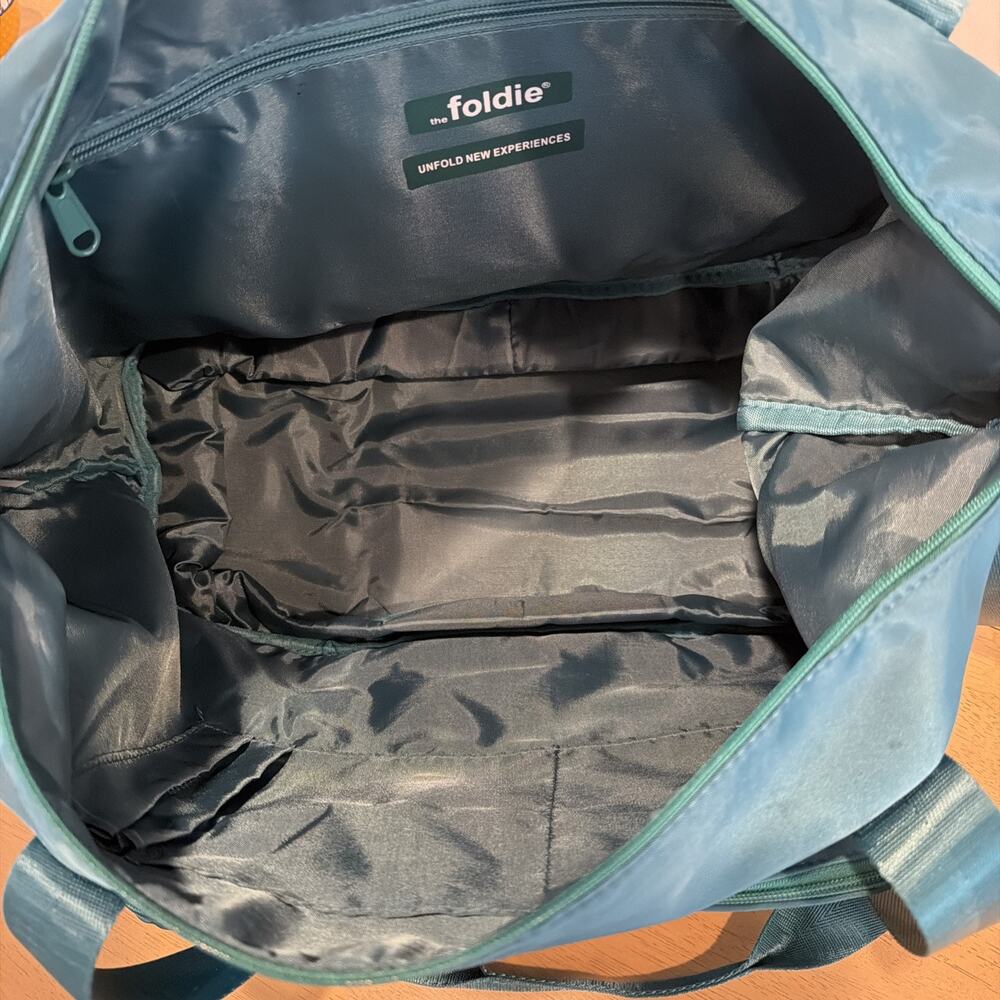 The Foldie Travel Bag 40L Teal Pockets Foldable Trolley Sleeve Carry On Expandab - Picture 12 of 15